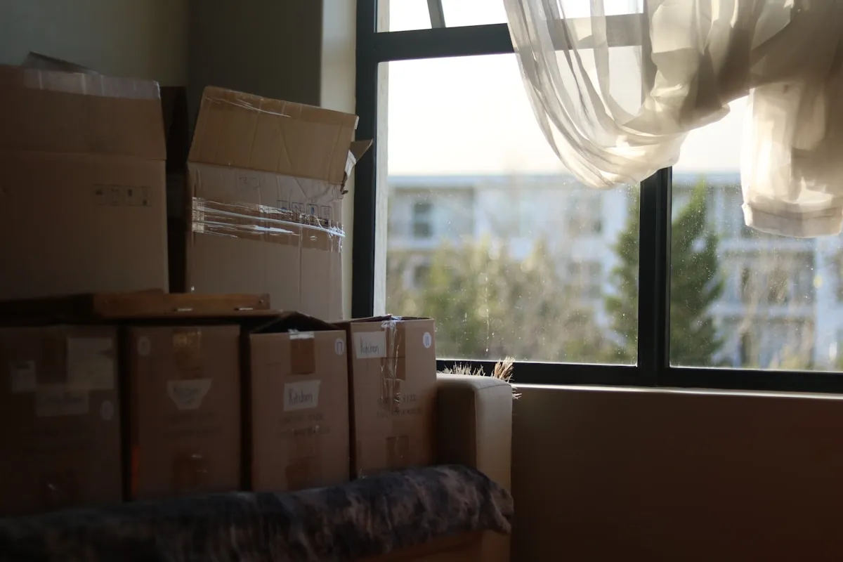 A room stacked with boxes waiting to be cleared out